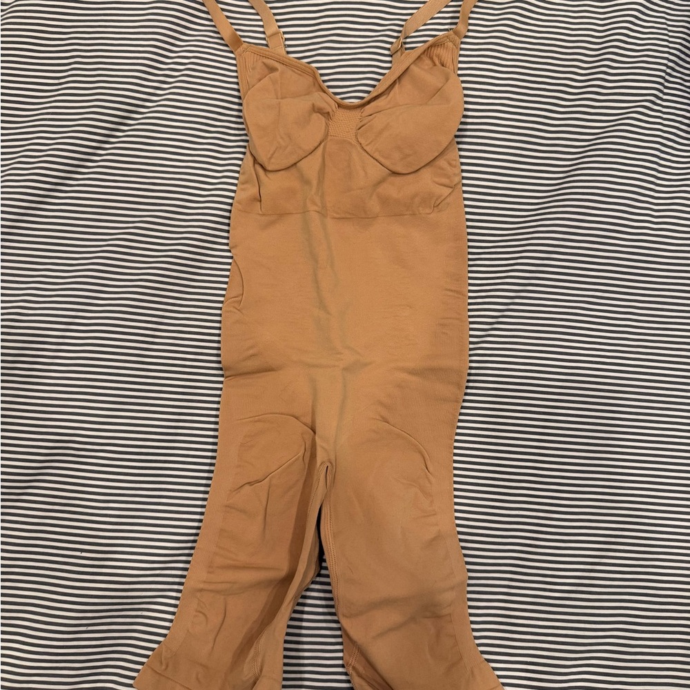 SKIMS Seamless Shaping Bodysuit in Warm Tan